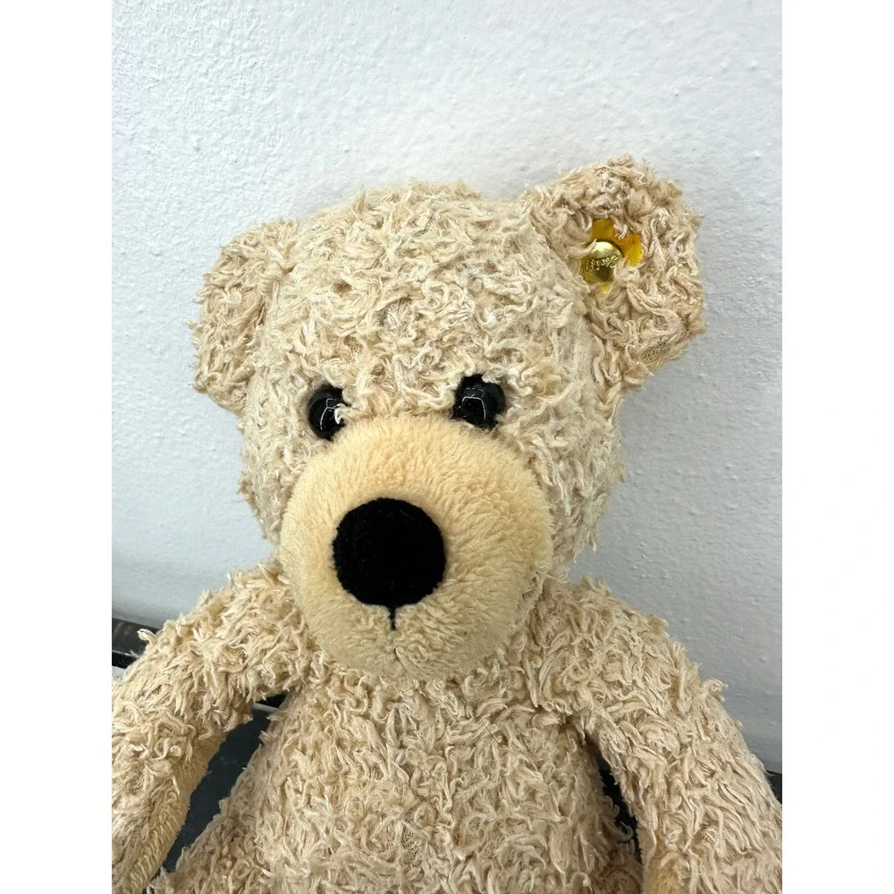 Small Steiff Fynn blonde stuffed teddy bear textured plush